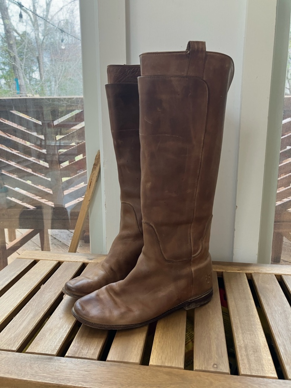 Knee high Frye leather boots